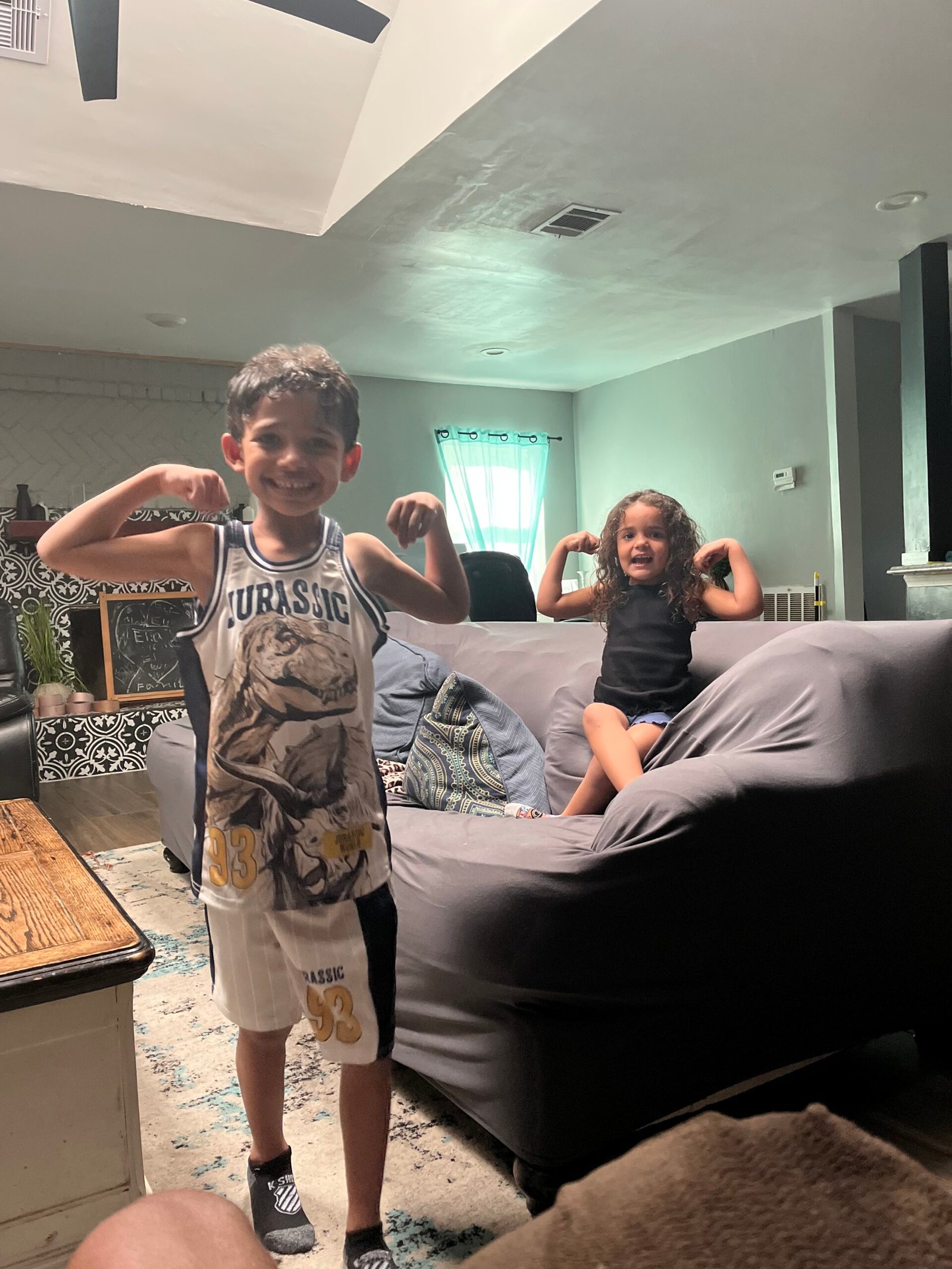 Coach Jaelon's children flexing